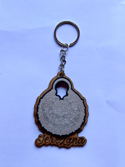 LLAVERO ARRACADA PLATA MDF